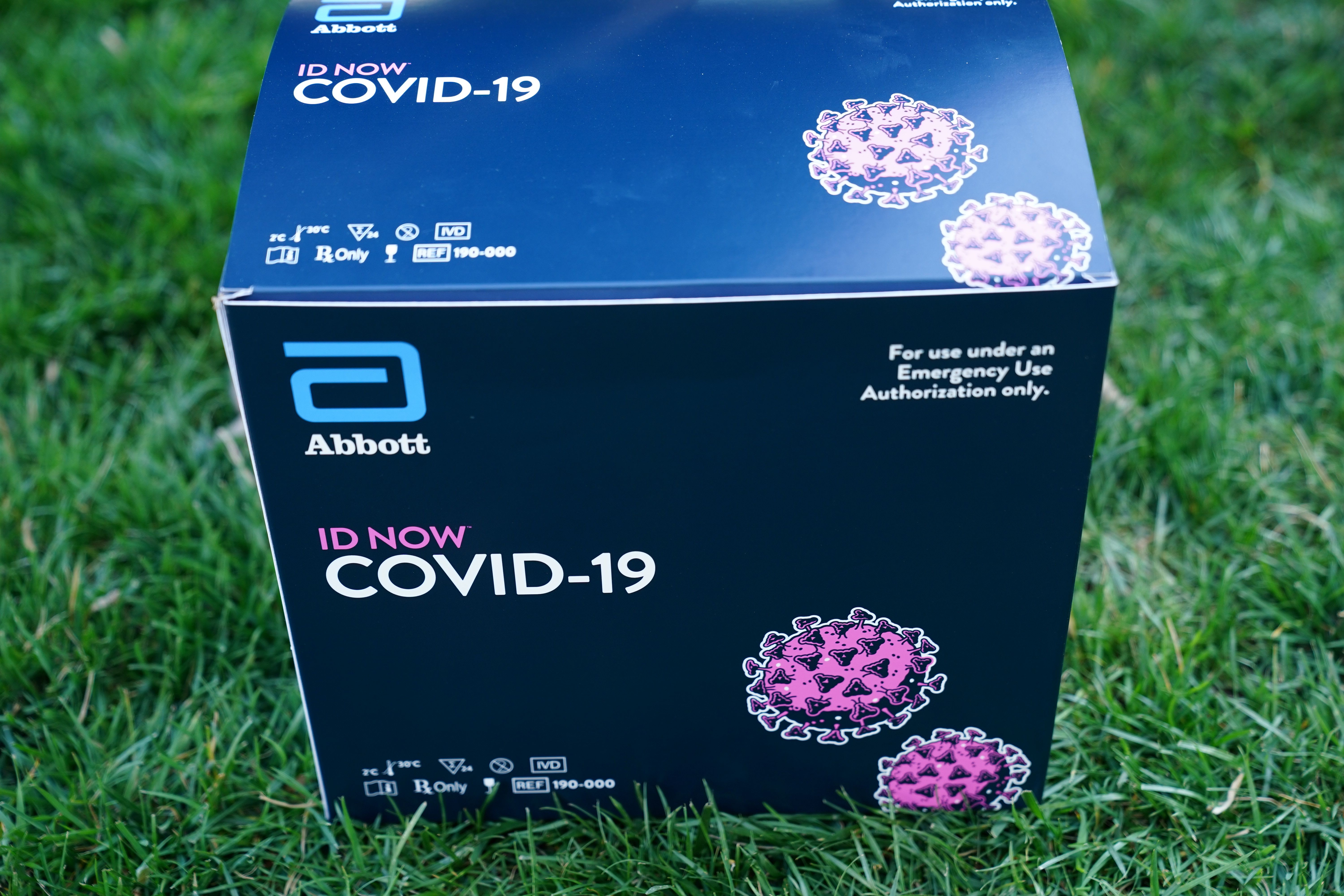 A box containing a 5-minute test for COVID-19 from Abbott Laboratories is pictured during the daily briefing on the novel coronavirus, COVID-19, in the Rose Garden of the White House in Washington, DC, on March 30, 2020.