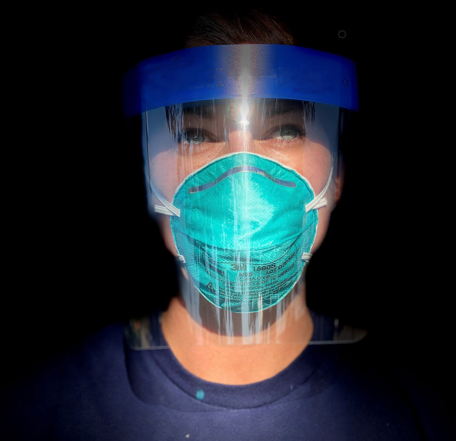 CDC responder Jesica Jacobs wears a face mask and shield during an assignment on the Rosebud Sioux Reservation in South Dakota.