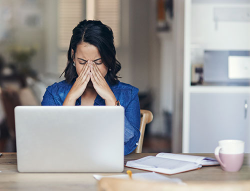 Female student using a laptop