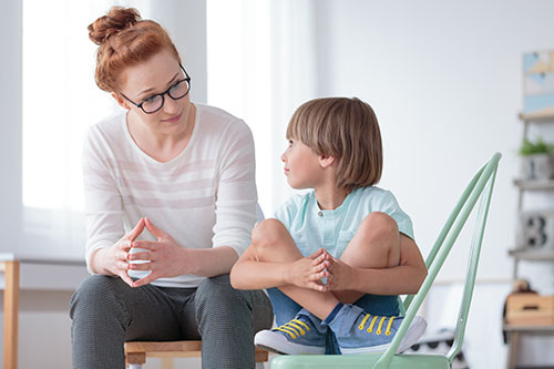 School psychologist with smart boy